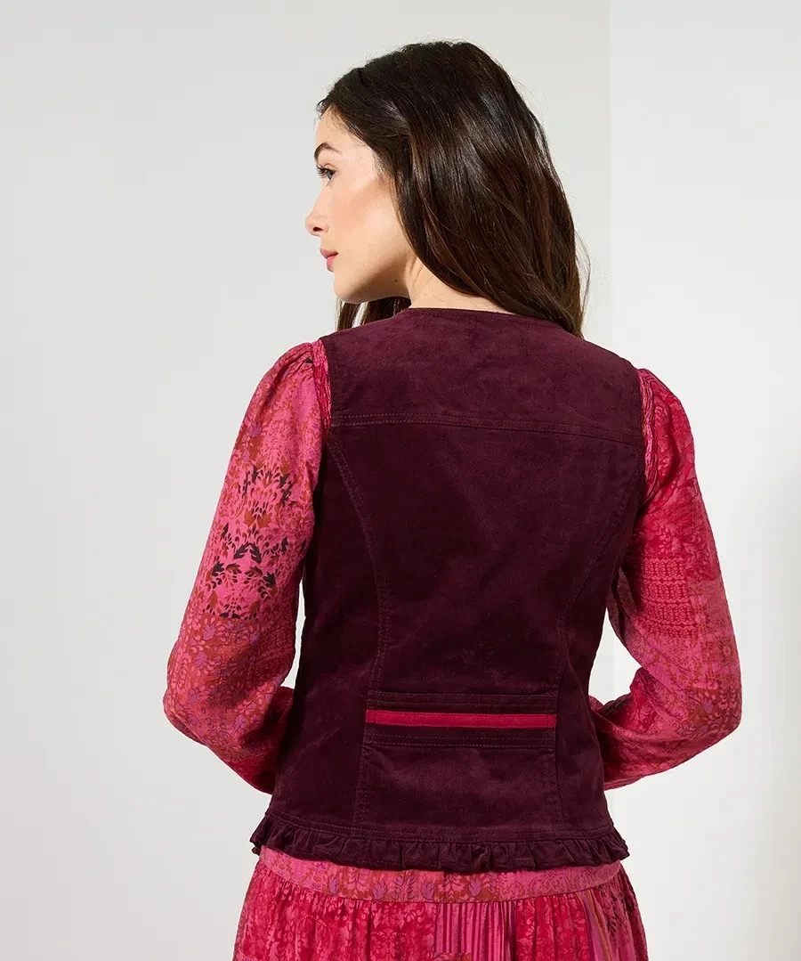Back view of the Freya waistcoat showing the ruffled hem
