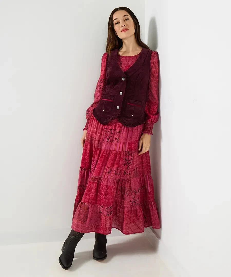 Full length view of the Freya waistcoat worn with a pink tiered skirt